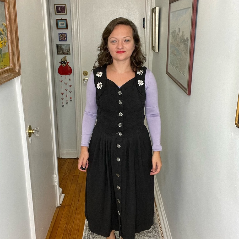 Traditional dirndl dress with flower buttons
